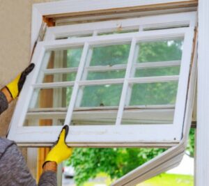 Window Installer Replacing a Broken Window Frame in Multiple Windows Damage Happened